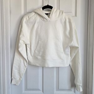 Aritzia TNA cropped white hoodie